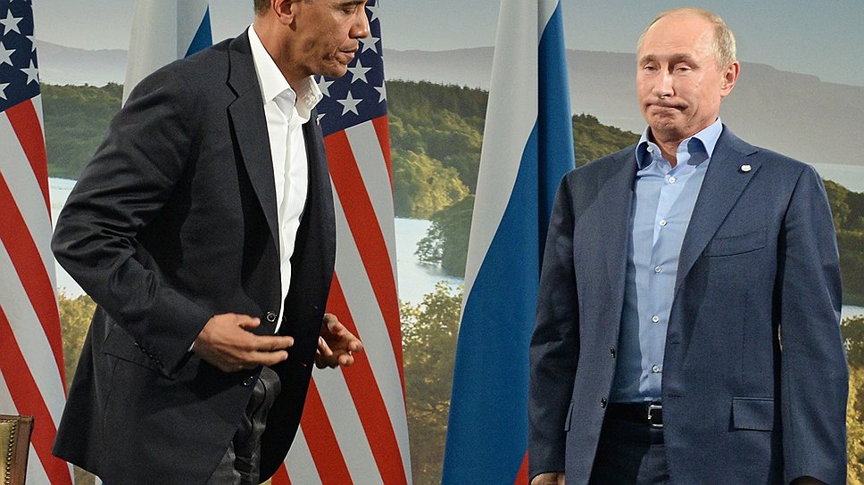 Президент Соединенных Штатов Америки Барак Обама и президент России Владимир Путин во время встречи на саммите стран G8