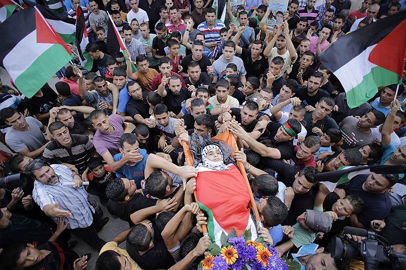 Похороны тринадцатилетнего палестинского мальчика в Бейт-Лакии, застреленного израильскими солдатами