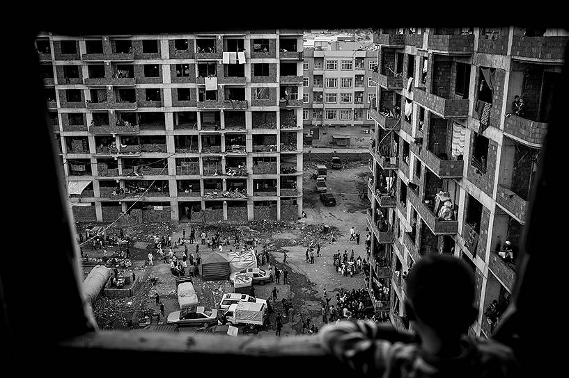 Автор: Кристиан Вернер. Поселения беженцев-езидов, спасающихся от геноцида в Синджаре в августе 2014 года (г. Захо, Ирак)