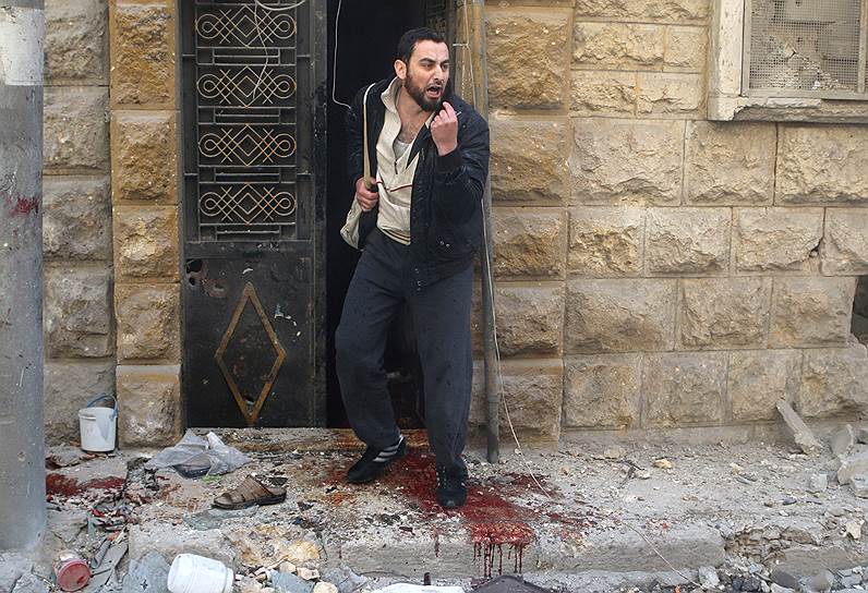 Алеппо, Сирия. Разрушения после обстрела боевиками района Аль-Фардус