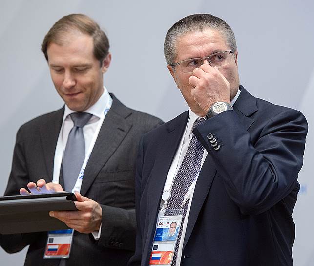 Министр промышленности и торговли России Денис Мантуров (слева) и министр экономического развития России Алексей Улюкаев