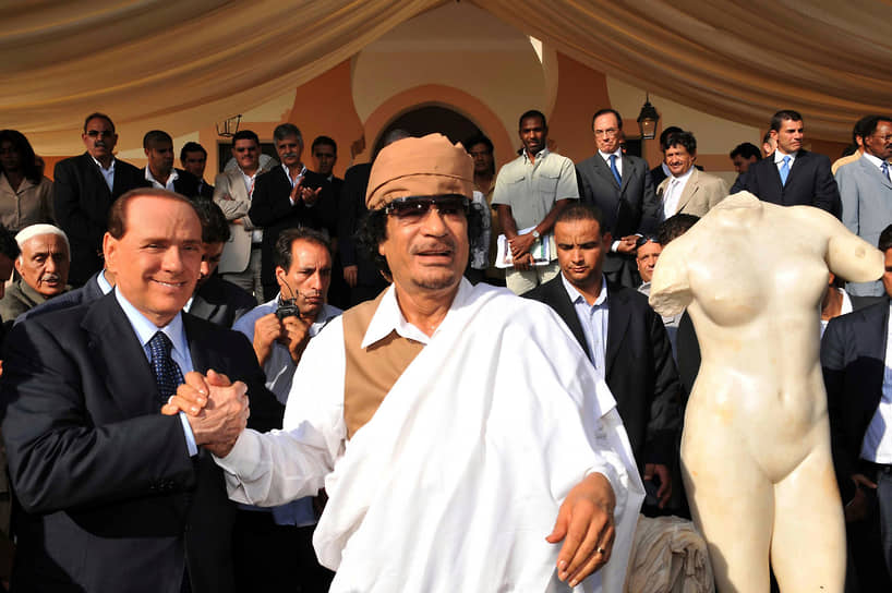 «Я пытался найти другие пути и другие решения, даже связывался с африканским лидером Каддафи. Но нам не удалось избежать военной операции» &lt;br>Сильвио Берлускони считался одним из политических союзников покойного ливийского лидера Муаммара Каддафи (на фото в центре) в Европе. 30 августа 2008 года Ливия и Италия подписали Договор о дружбе и сотрудничестве, что не помешало в дальнейшем Сильвио Берлускони поддержать военную операцию в Ливии, направленную на свержение Каддафи