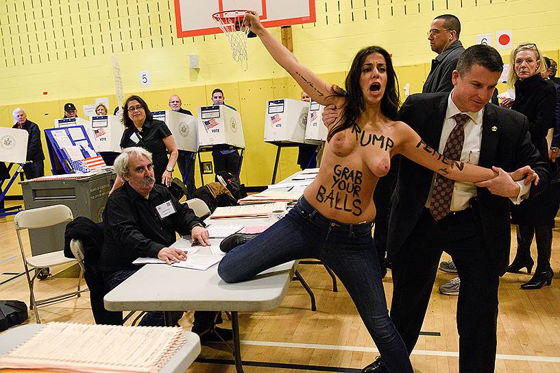 Задержание активистки FEMEN на участке, где было запланировано голосование Дональда Трампа