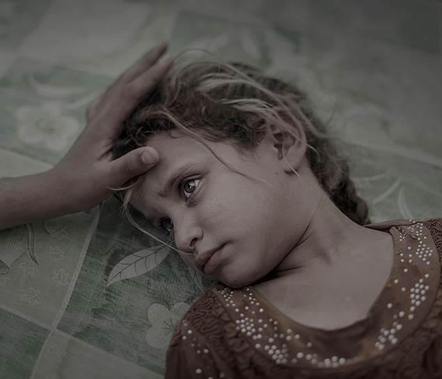 Победитель в номинации «Люди. Одиночный снимок». Пятилетняя девочка в лагере для беженцев. Ее семья была вынуждена покинуть дом после того, как боевики «Исламского государства» захватили Мосул (Ирак)