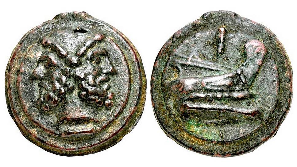 На тяжелой медной римской монете портрет отличался двуликостью