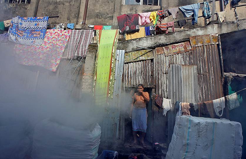 Калькутта, Индия. Дезинфекция на рынке для предотвращения распространения лихорадки Денге
