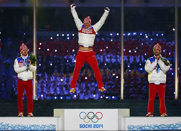 Слева направо: российские лыжники Максим Вылегжанин, Александр Легков и Илья Черноусов