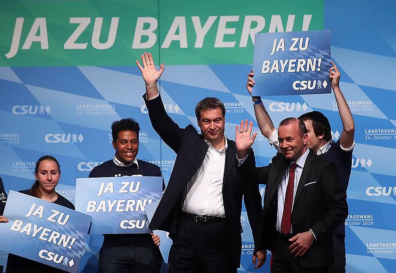 Премьер-министр Баварии Маркус Зёдер (в центре)
