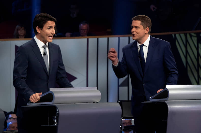 Премьер-министр Канады Джастин Трюдо (слева) и лидер Консервативной партии Эндрю Шир