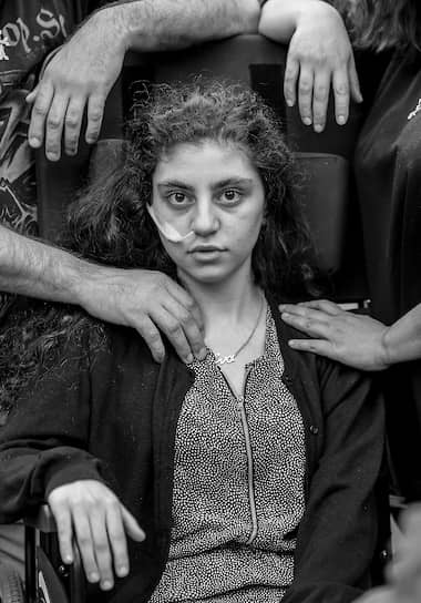 Лучшим в категории «Портреты» стал снимок армянской беженки в Польше фотографа Томека Качора