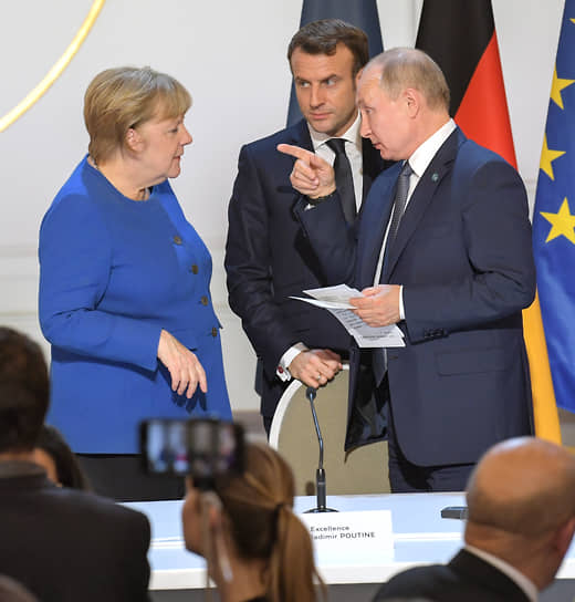 Слева направо: канцлер ФРГ Ангела Меркель, президент Франции Эмманюэль Макрон и президент России Владимир Путин