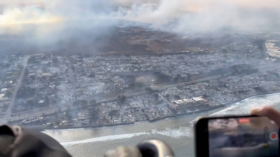 Вид с воздуха на разрушения в Лахайне, вызванные лесными пожарами