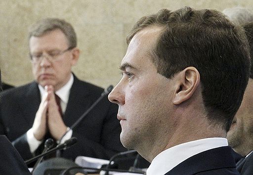 Бывший министр финансов России Алексей Кудрин и президент России Дмитрий Медведев