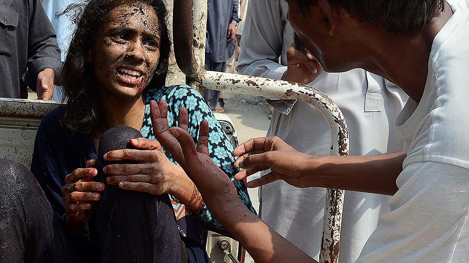 Пакистанские христиане (на фото — одна из раненых в Пешаваре) считают, что правительство не может или не хочет защитить их от исламских радикалов 