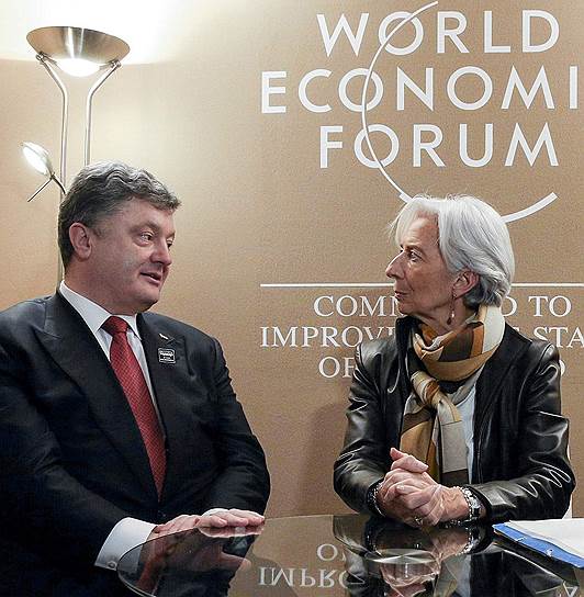 Директор-распорядитель МВФ Кристин Лагард открыла президенту Украины Петру Порошенко новую кредитную линию для оплаты старых долгов