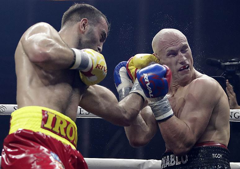 В бою с Кшиштофом Влодарчиком Мурат Гассиев (слева) доказал, что является одним из лучших «панчеров» современного бокса