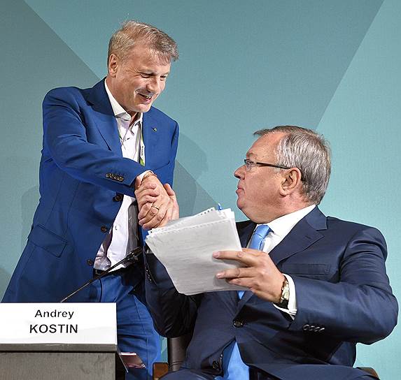 Главы Сбербанка Герман Греф (слева) и ВТБ Андрей Костин