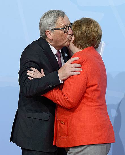 Президент Европейской комиссии Жан-Клод Юнкер и федеральный канцлер Германии Ангела Меркель 