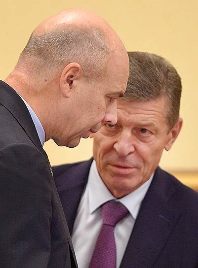 Первый вице-премьер Антон Силуанов (слева) и вице-премьер Дмитрий Козак (справа) пока не могут найти устраивающий всех новый формат инвестрежимов