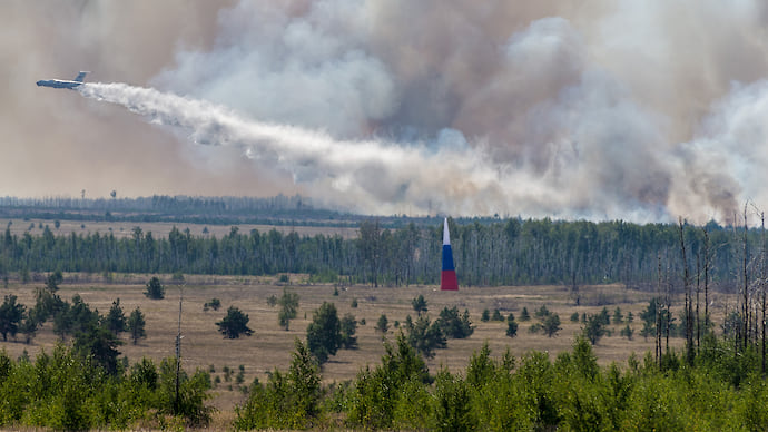 Лесные пожары стягиваются в центр
