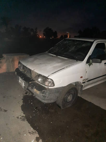 Поврежденная в результате удара ракет машина в Багдаде