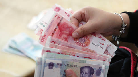Хоть юанем покати // Банки вновь привлекают у ЦБ китайскую валюту