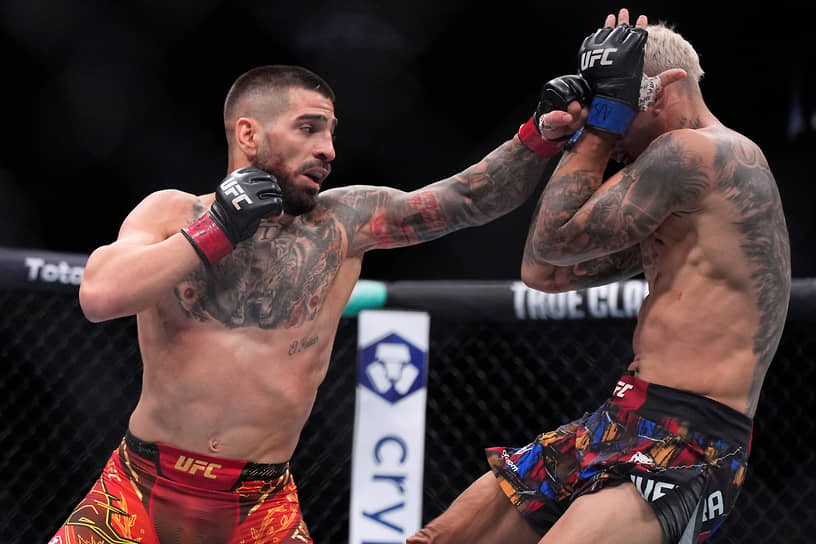 Илия Топурия против Чарльза Оливейры в бою за пояс чемпиона UFC в легком весе (до 70 кг)