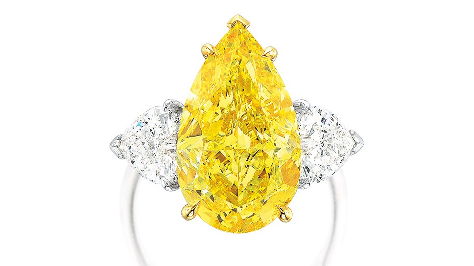 Кольцо с очень редким желтым бриллиантом цвета Fancy Vivid Yellow и бриллиантами
