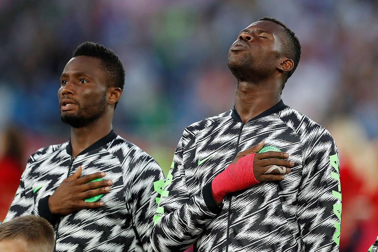 Soccer Football - World Cup - Group D - Croatia vs Nigeria - Kaliningrad Stadium, Kaliningrad, Russia - June 16, 2018   Nigeria&#39;s John Obi Mikel and Francis Uzoho during the national anthem before the match    