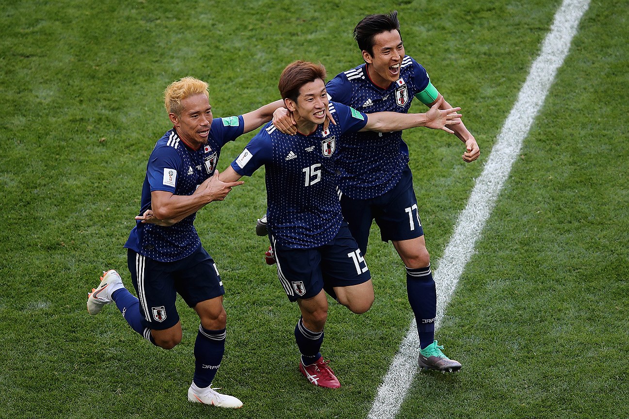 SARANSK, RUSSIA - JUNE 19:  Yuya Osako of Japan celebrates scoring the 2nd Japan goal to make it 2-1 with Yuto Nagatomo and Makoto Hasebe of Japan during the 2018 FIFA World Cup Russia group H match between Colombia and Japan at Mordovia Arena on June 19, 2018 in Saransk, Russia.  (