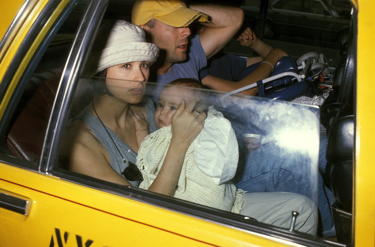 Деми Мур и Брюс Уиллис с дочерью Румер Уиллис, 1989
