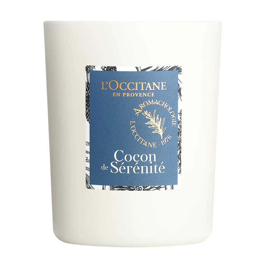 L’Occitane, расслабляющая парфюмированная свеча Cocon De Serenite с эфирным маслом лаванды, нотами бергамота, мандарина, сладкого апельсина и герани.
