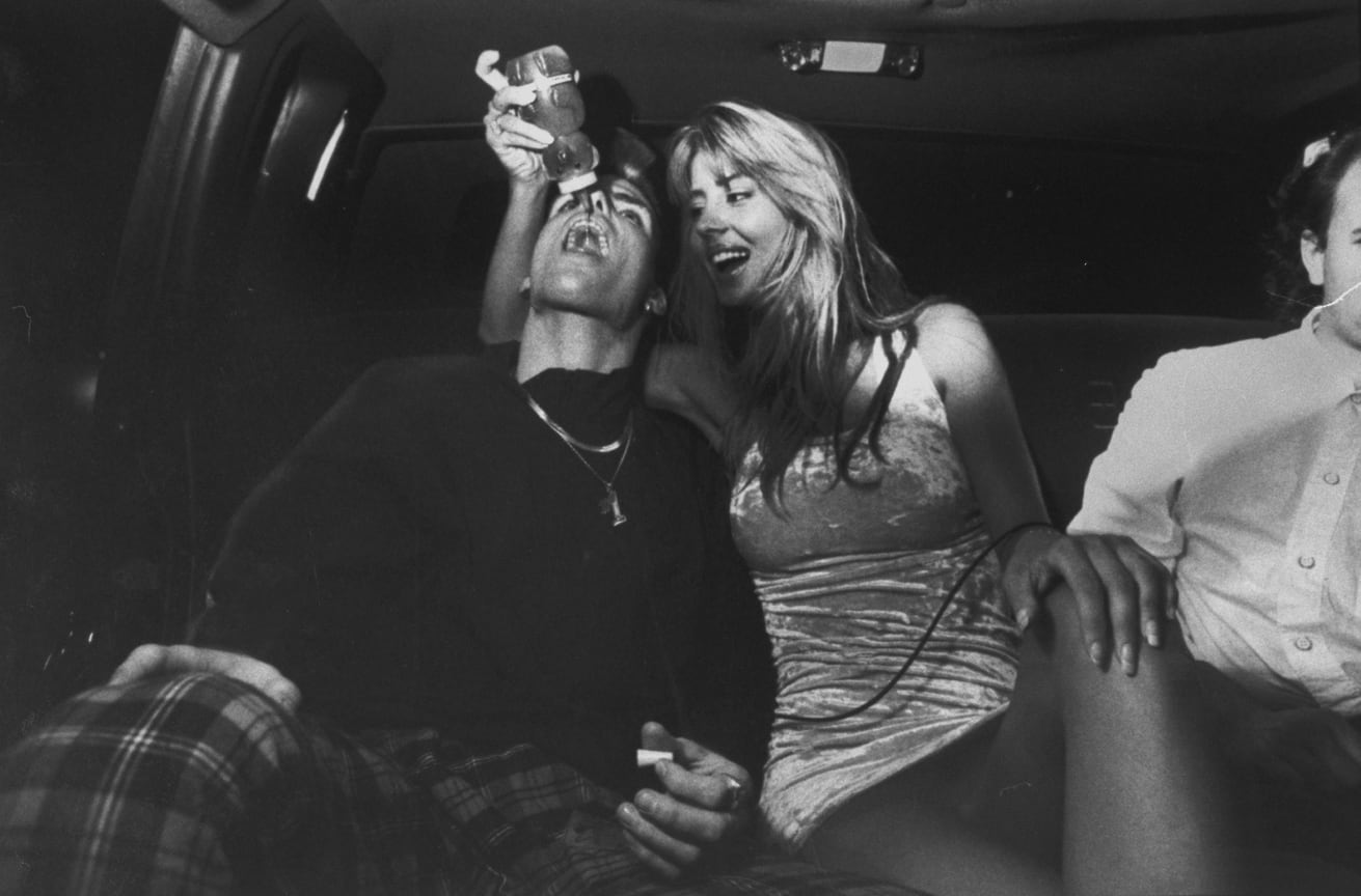 С моделью Роуэн Брюер на заднем сиденье лимузина, 1991 год.