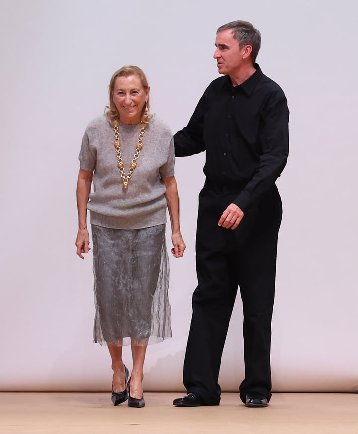 2020 – Миучча Прада и СЕО марки Патрицио Бертелли объявили, что Раф Симонс стал со-креативным директором Prada. Он работает вместе с Миуччей над созданием коллекций и представил первую совместную коллекцию в Милане.
