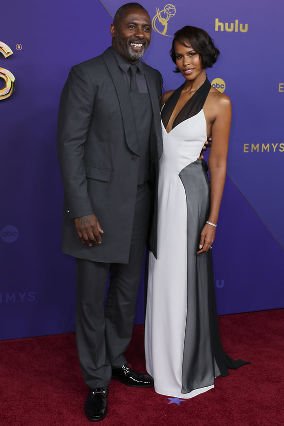 Идрис Эльба в Calvin Klein и его жена Сабрина Доур в Mugler