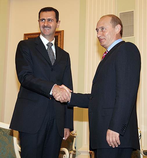Президент России Владимир Путин (справа) и президент Сирии Башар Асад (слева)