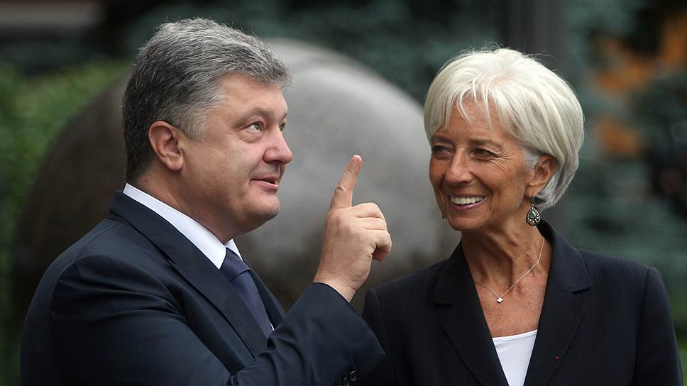 Президент Украины Петр Порошенко (слева) и директор-распорядитель Международного валютного фонда (МВФ) Кристин Лагард (справа)