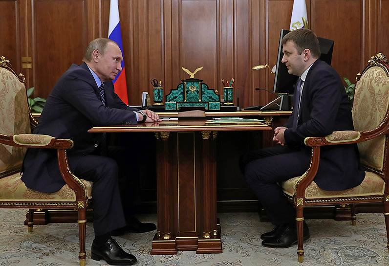 Президент России Владимир Путин и мининстр экономического развития Максим Орешкин