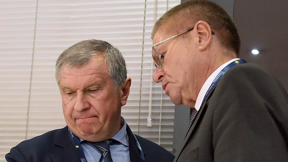 Глава «Роснефти» Игорь Сечин (слева) и бывший министр экономического развития Алексей Улюкаев