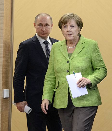 Канцлер Германии Ангела Меркель (справа) и президент России Владимир Путин