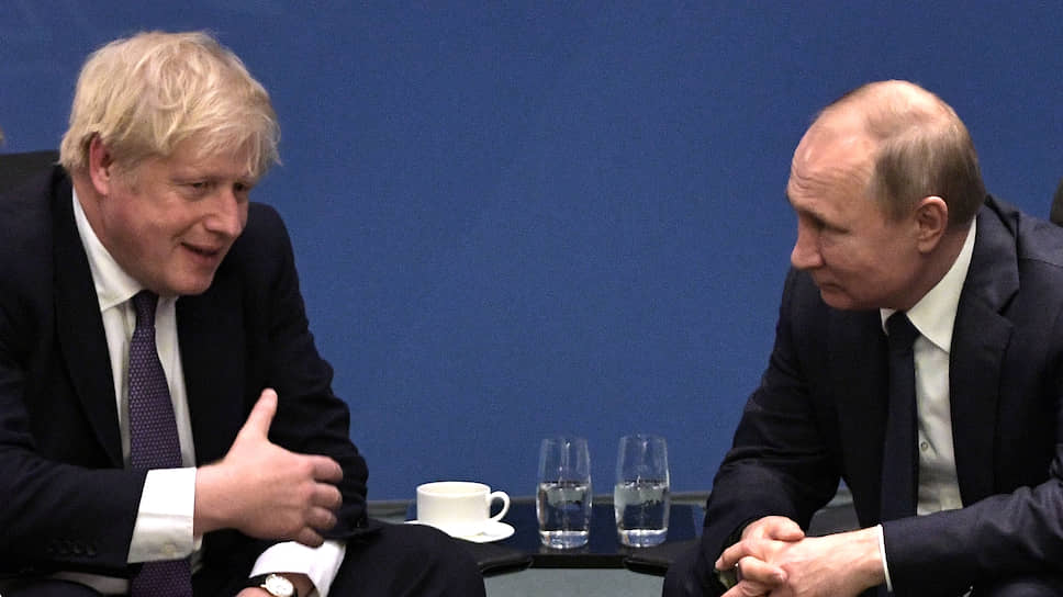 Премьер-министр Великобритании Борис Джонсон (слева) и президент России Владимир Путин
