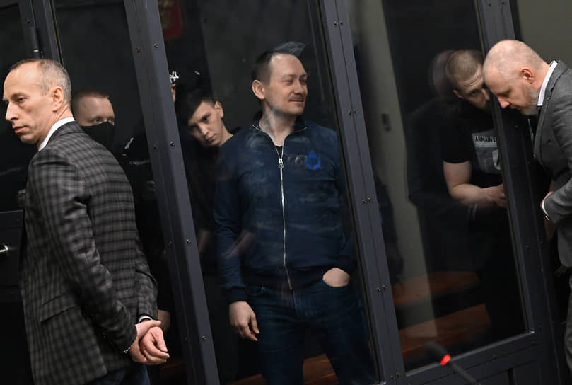 Бывшие полицейские Роман Феофанов, Акбар Сергалиев, Игорь Ляховец и Максим Уметбаев во время заседания суда в марте 2022 года