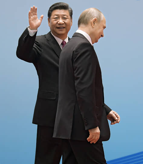 Си Цзиньпин (слева) и Владимир Путин 