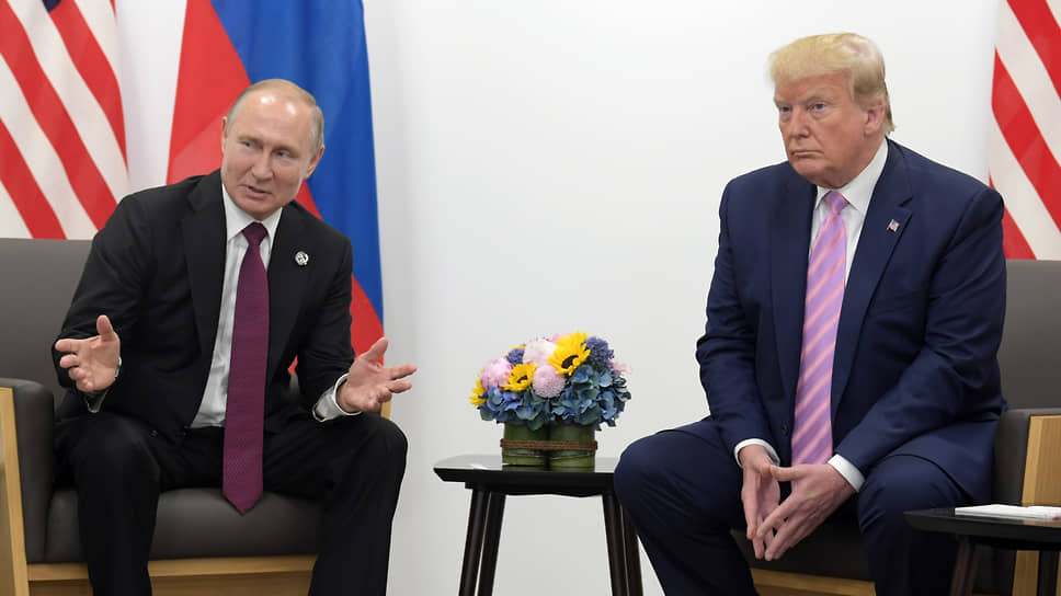 Президент России Владимир Путин (слева) и президент США Дональд Трамп 