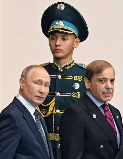 Президент России Владимир Путин и премьер-министр Пакистана Шахбаз Шариф