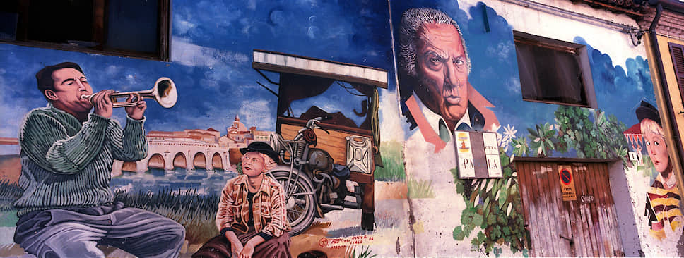 Граффити с изображением Феллини в Италии повсюду