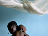 Джон Станмейер. Малярия. Вунель Касачи и ее 10-месячный сын. Замбия. 2006