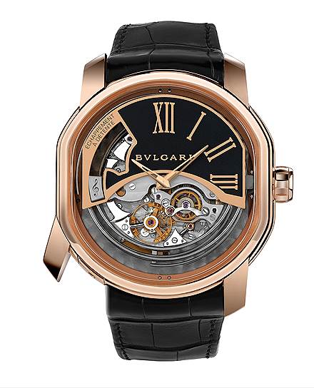 Bvlgari Ammiraglio Del Tempo, Repetition Minutes et Carillon Westminster. Минутный репетир с четырьмя молоточками и четырьмя гонгами имеет спуск с фиксатором и передачу для сохранения постоянной силы механизма. Пуск репетира осуществляется кнопкой, замаскированной под крепление ремешка. &quot;Адмирал времени&quot; --  часы, существующие в серии из 20 моделей в корпусе розового золота и 10 моделей в корпусе белого золота