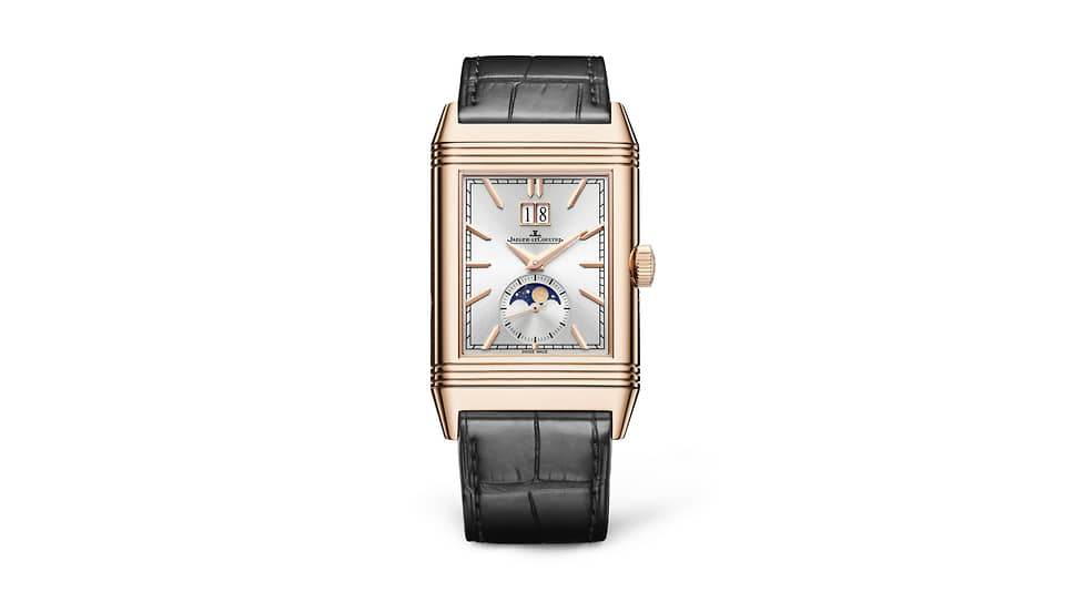 Jaeger-LeCoultre Reverso Tribute Nonantieme. Корпус из розового золота 49,4 x 29,9 х 11,72 мм с механизмом Jaeger-LeCoultre 826 с ручным подзаводом и запасом хода 42 часа. На одном циферблате — стрелки, окно даты и указатель фаз Луны, на другом — окно «прыгающего часа» и диск минут с изображением ночного неба на синем лаке с золотыми звездами