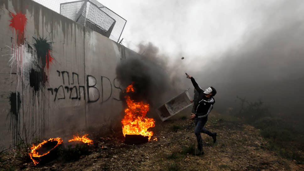 Забор на границе Израиля с Палестинской автономией. Для одних — символ оккуппаци... 